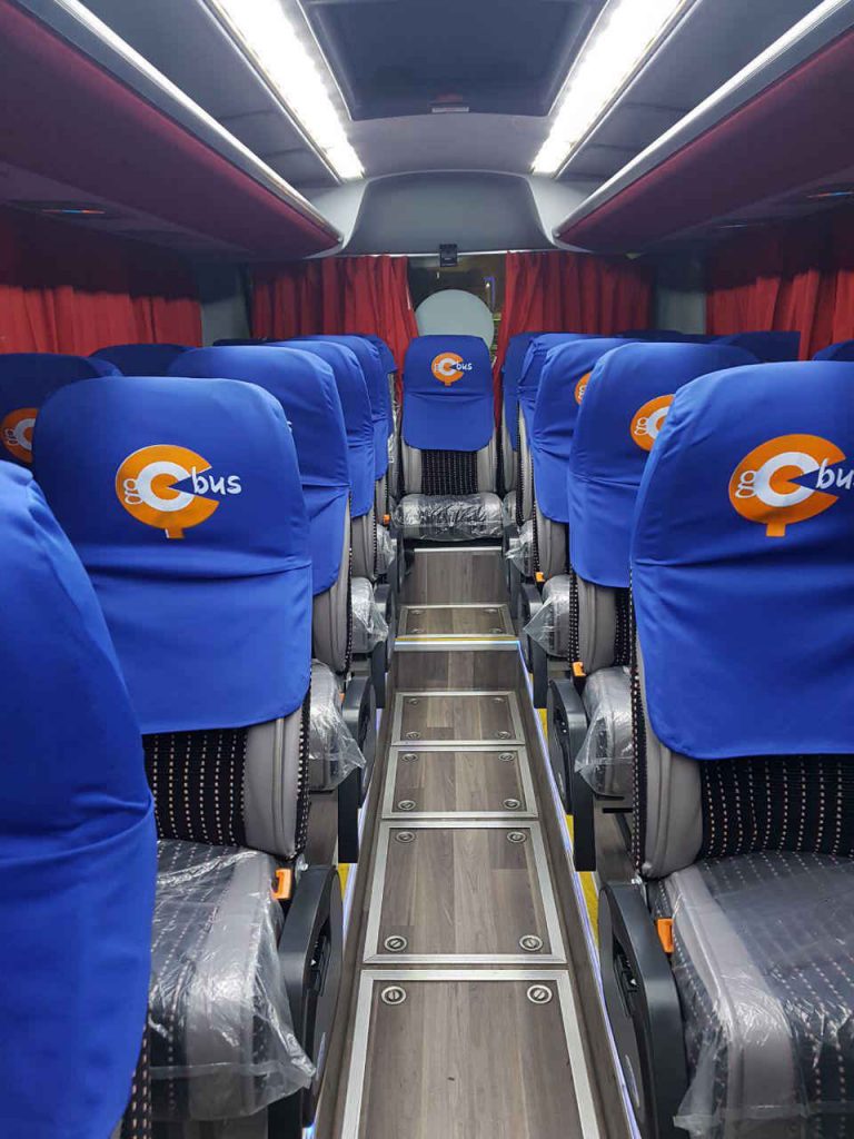 Go Bus long-distance coach cabin with blue branded seat covers