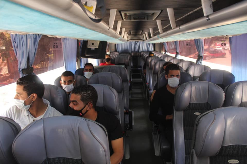 Passengers seated inside a Super Jet coach cabin